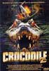 CROCODILE 2 - Le cauchemar ne fait que commencer pour Mia, l'hôtesse de l'air, et le petit groupe de survivants, lorsque, sous les yeux, le pilote est dévoré par un gigantesque crocodile.